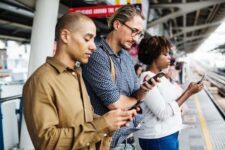 People looking at phones