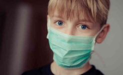 Boy in surgical mask